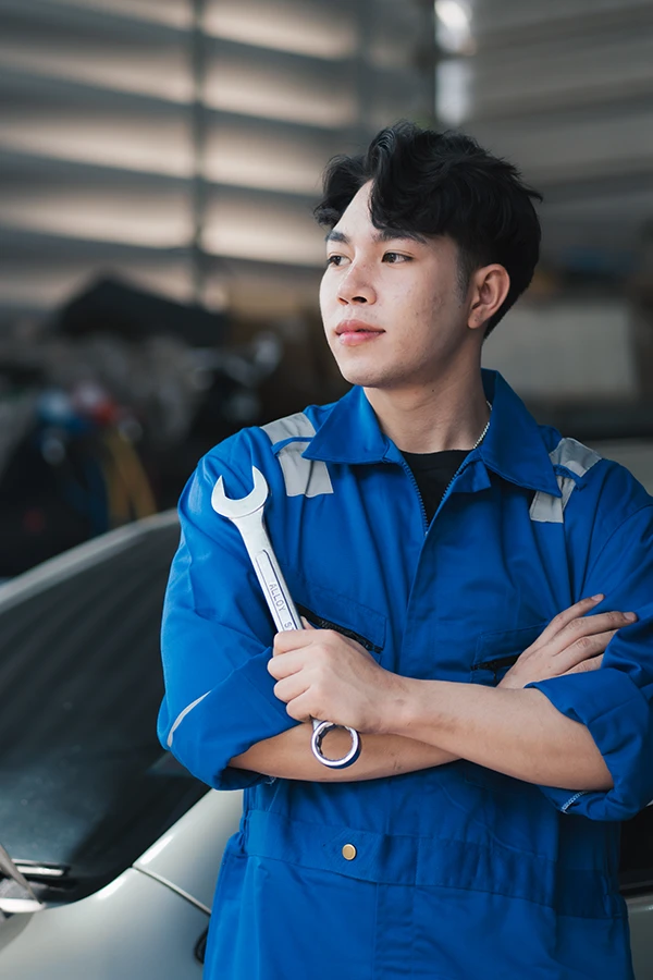 auto-mechanic-smith-with-wrench-car-workshop copy